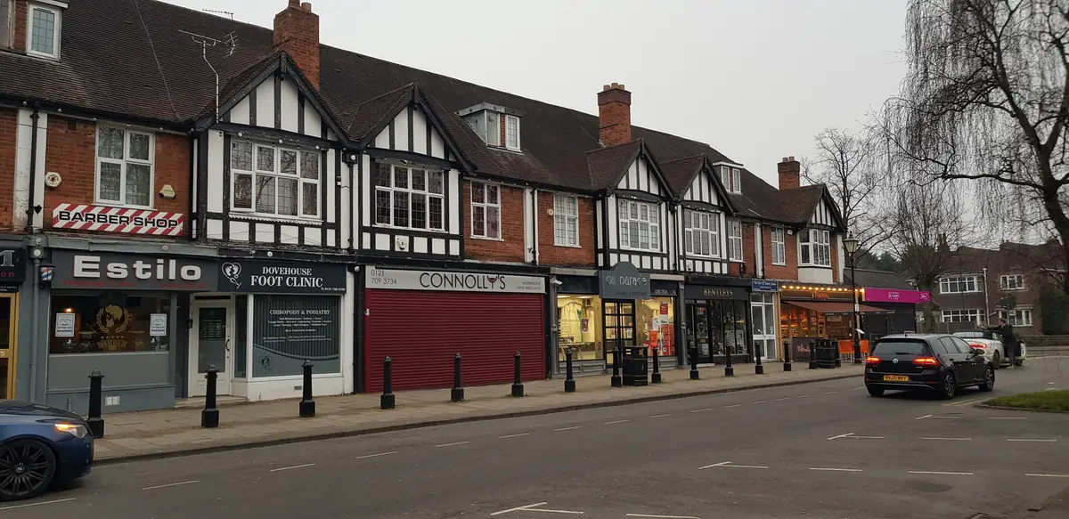 Shops along Dovehouse Parade in Olton.